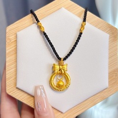 在逃公主蝴蝶結鈴鐺編織項鍊 黃銅鍍金吊墜女款時尚百搭廠家直供