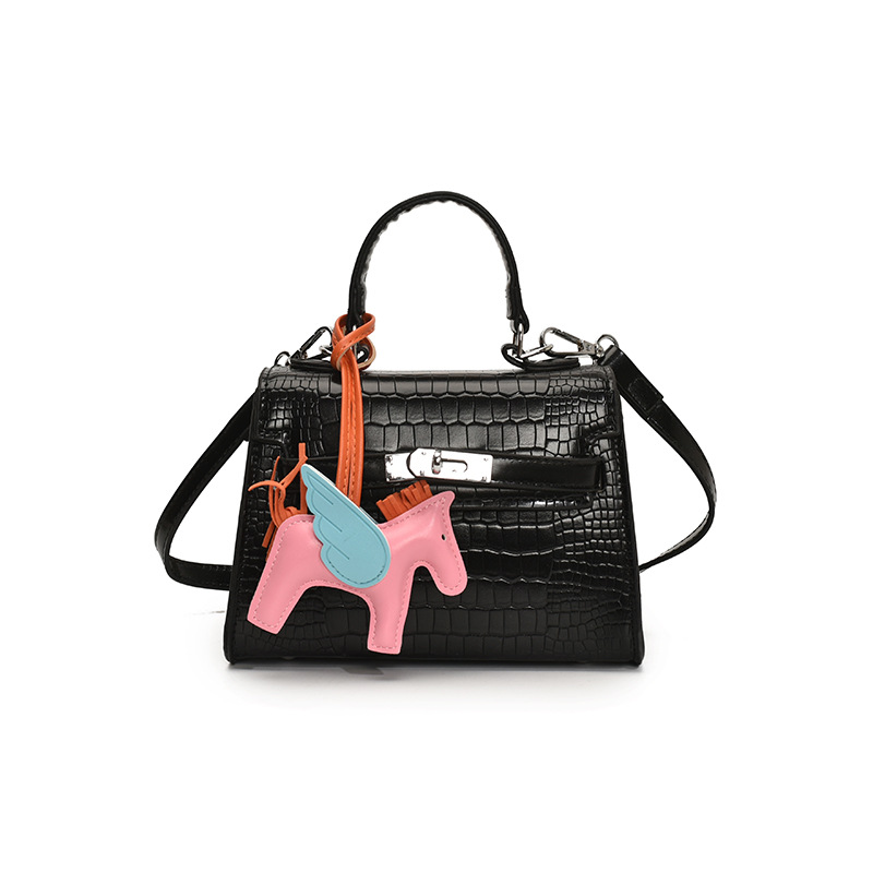 Bolso Kelly de mano de alta gama para mujer 2025 nueva moda casual bolso de hombro con patrón de piedra moda bolso de mensajero de color sólido