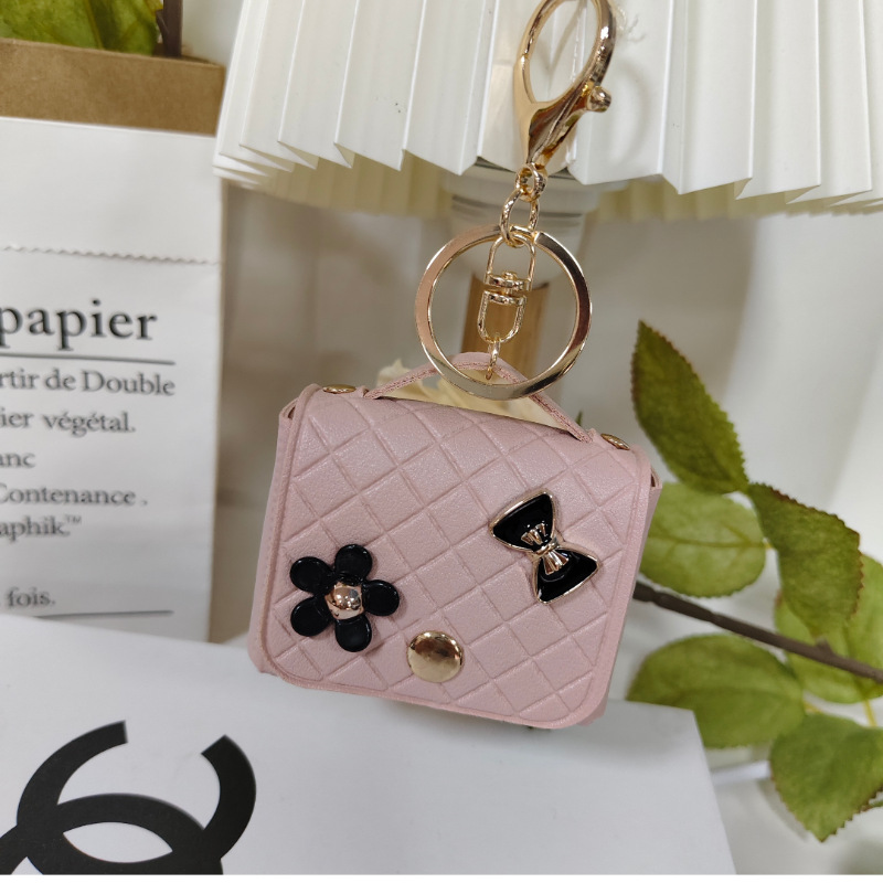Nuevo estilo transfronterizo, moderno y exclusivo mini bolso acolchado tipo colgante, monedero para llaves, accesorio para auriculares.
