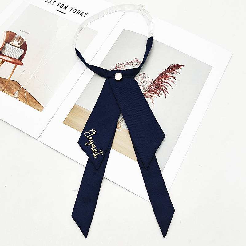 Fabricante spot color sólido jk pajarita versión coreana femenina estilo universitario arco foto de graduación traje de soltero bordado cuello flor serpentina