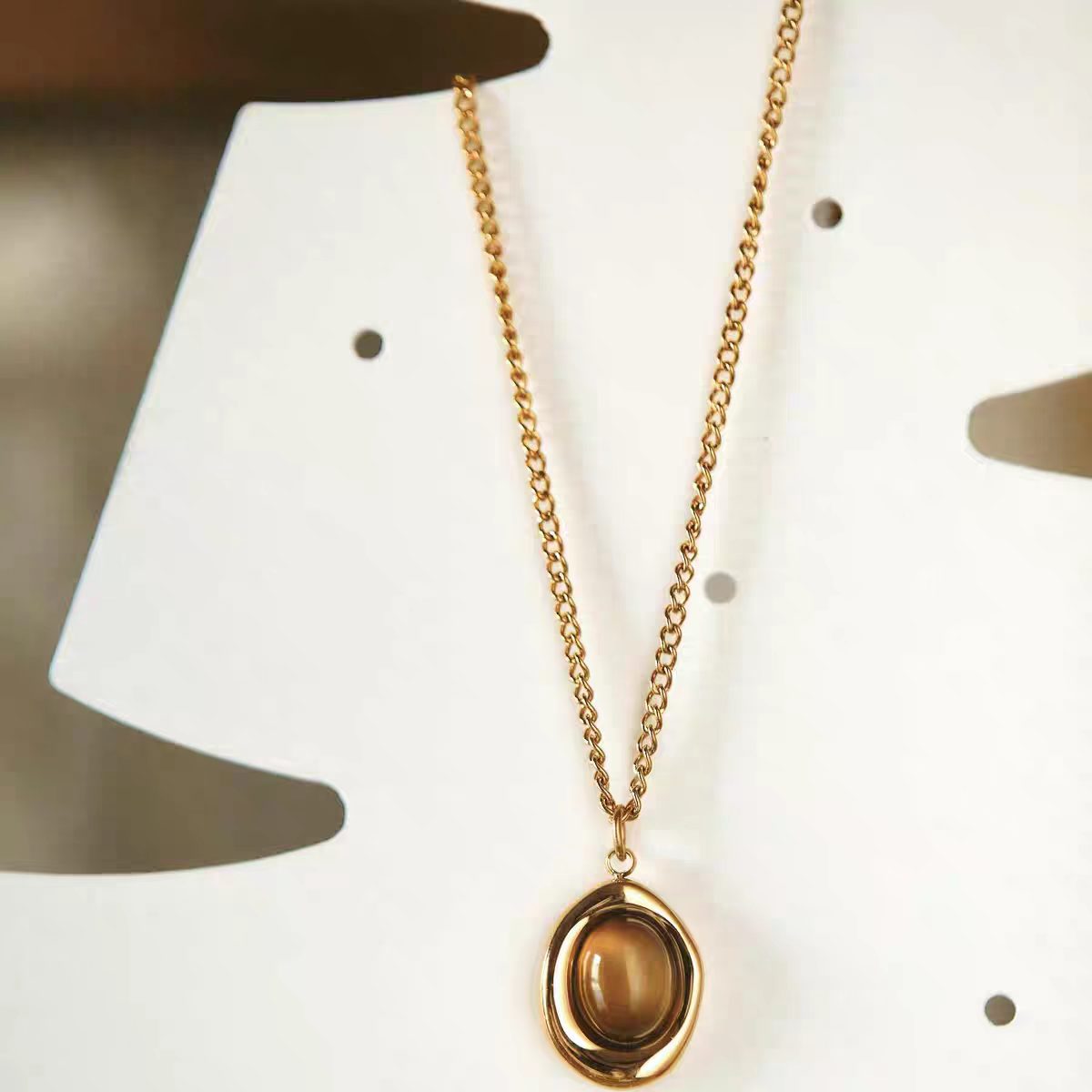 Maillard-style natural tiger eye stone coffee bean fashion collarbone chain necklace and earring set titanium steel cross-border small commodity