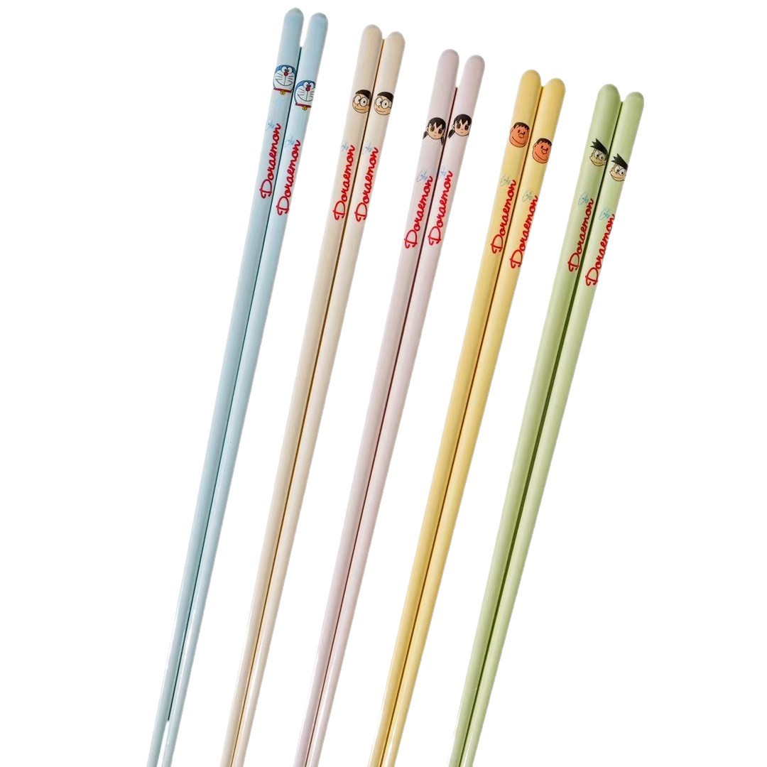 Auténtico autorizado Doraemon cerámica palillos acompañante de mano cartón de dibujos animados saludable no tóxico limpio caja de regalo palillos de alto valor facial