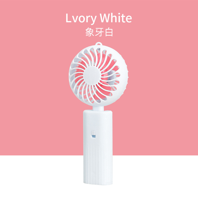 Venta al por mayor mudo gran viento plegable ventilador de mano niños portátil mini ventilador N ° 5 batería regalo LOGO