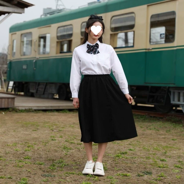 Female white long sleeves + full skirt + blue crown tie