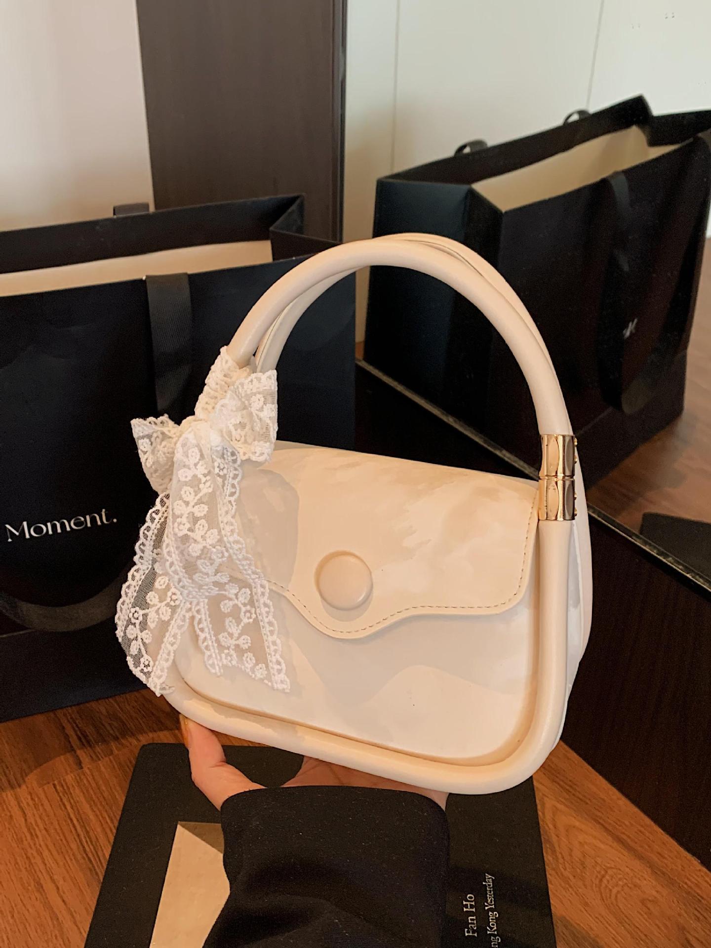 Bolso cuadrado pequeño de mano de estilo occidental de moda para mujer 2025 nuevo bolso de hombro casual de todo fósforo bolso de mensajero de alta calidad transfronterizo