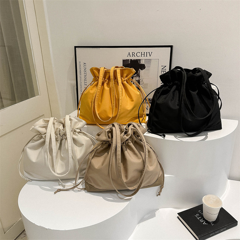 Single shoulder bag winter trendy drawstring large capacity storage bag 2023 new western style casual solid color portable big bag for women