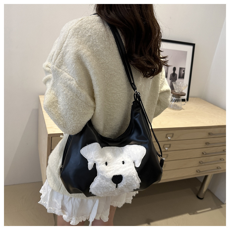 The new autumn and winter 2024 fashion cartoon backpack with simple, individual and niche design, single-shoulder bag and commuter tote bag undefined
