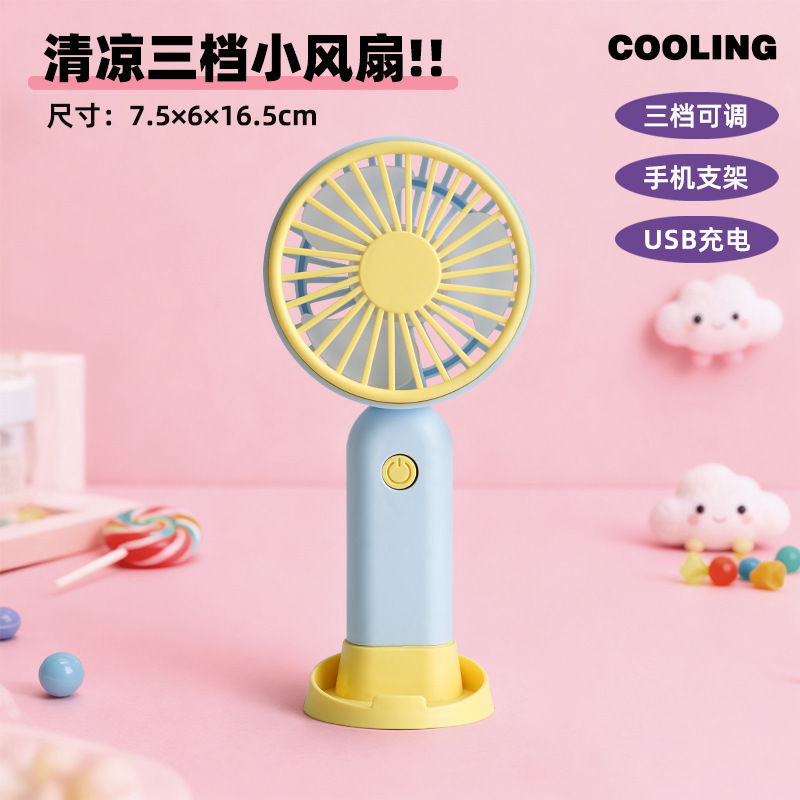 2025 nuevo ventilador de mano pequeño regalo de estudiante de dibujos animados lindo escritorio portátil mini ventilador de carga USB