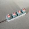 Four-button white shell - silicone grey cat paw