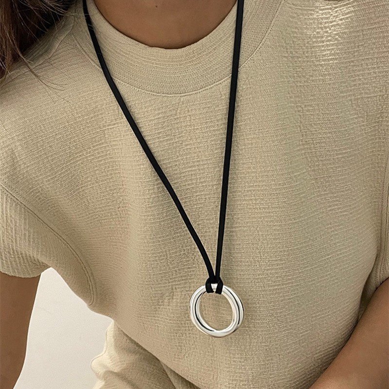 Nuevo estilo de cuero chino, colgante, collar de borlas, estilo étnico femenino, cadena de suéter retro de nicho, moda, artículos de alta gama