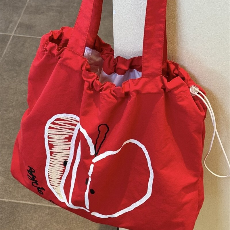 Apple New Drawstring Canvas Bag Student Lightweight Commuter All-match Shoulder Bag Niche Large Capacity Simple Tote Apple New Drawstring Canvas Bag Student Lightweight Commuter All-match Shoulder Bag Niche Large Capacity Simple Tote