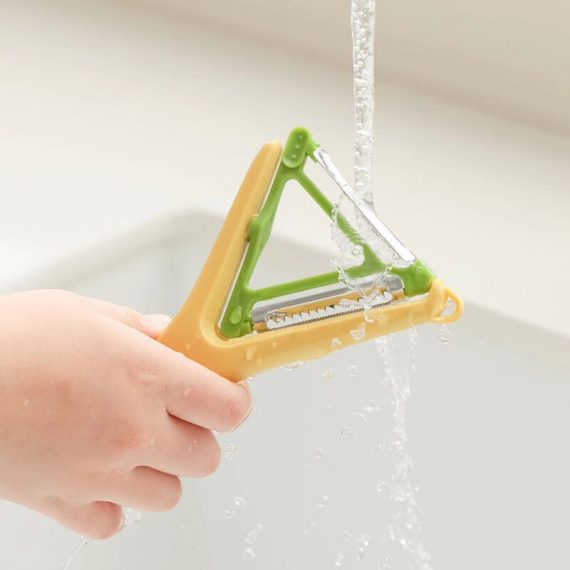 新しいステンレスの皮むき器の2色の家庭用瓜削りのアイデアの多機能の皮むきの刀の2合1のジャガイモは皮をむいて不思議です。|undefined