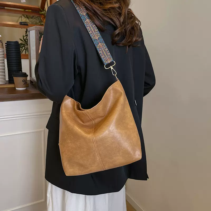 小众包包女2025夏季时尚潮流水桶包休闲洋气手提包新款简约单肩包