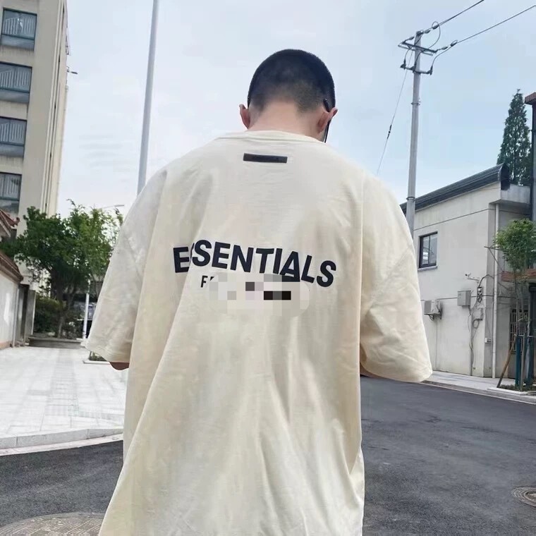 Trendy Brand Ess Short-Sleeved Loose Casual T-Shirt with Printed Letters on the Back, Unisex Couple Wear, Wholesale Couple Style Trendy Brand Ess Short-Sleeved Loose Casual T-Shirt with Printed Letters on the Back, Unisex Couple Wear, Wholesale Couple Style