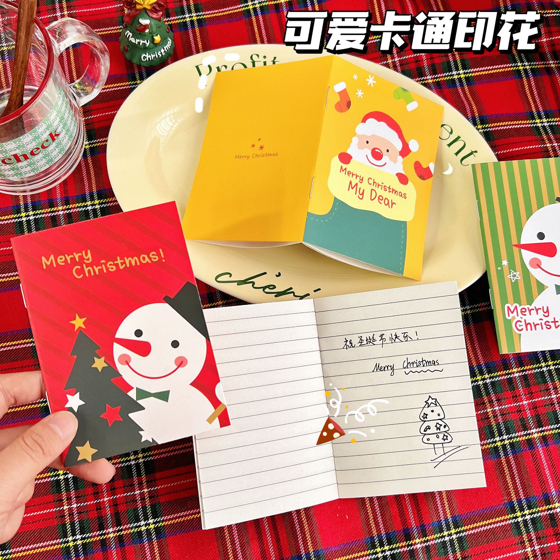 Dibujos animados de año nuevo pequeño cuaderno 64k copia suave bloc de notas de bolsillo taobao año nuevo pequeño regalo al por mayor