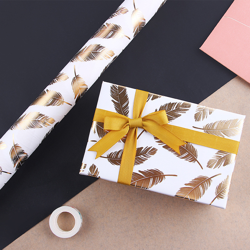 Papel de regalo de cumpleaños de San Valentín de Navidad traje de papel de regalo al por mayor Papel de regalo diario de onda bronceado
