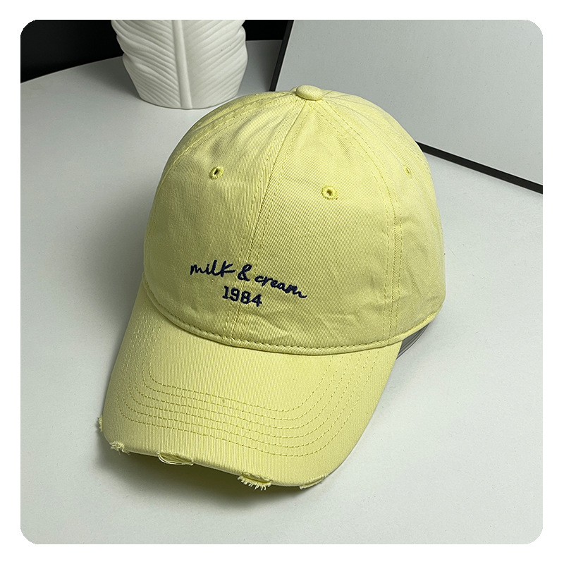 agujero nuevo sombrero de béisbol bordado de letras mujer simple cara pequeña gorra de lengua de goma ancha primavera y verano sombrero de pareja hombre