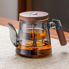 現物のふわふわしたカップのティーポットの全ガラスの内胆家庭用プレス式のワンボタンのお茶の分離した泡のカップのふわふわしたカップ