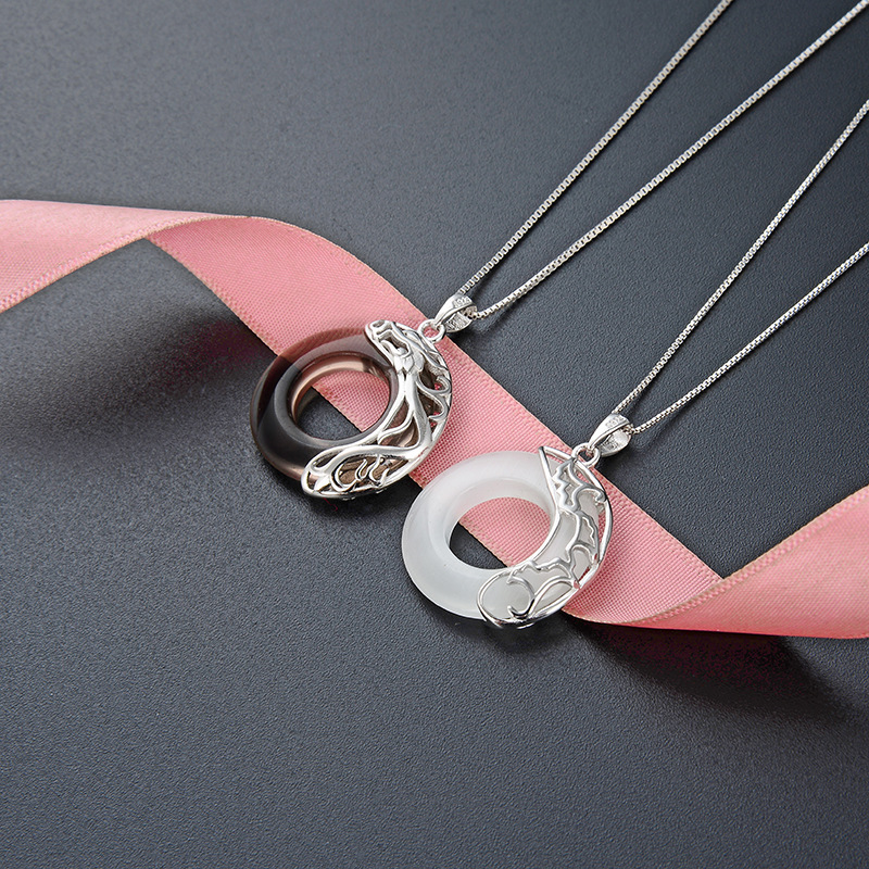 925 plata esterlina collar de estrellas sol y luna nicho femenino simple sensación de alto nivel de la vida del año perteneciente a la seguridad del dragón colgante para niños