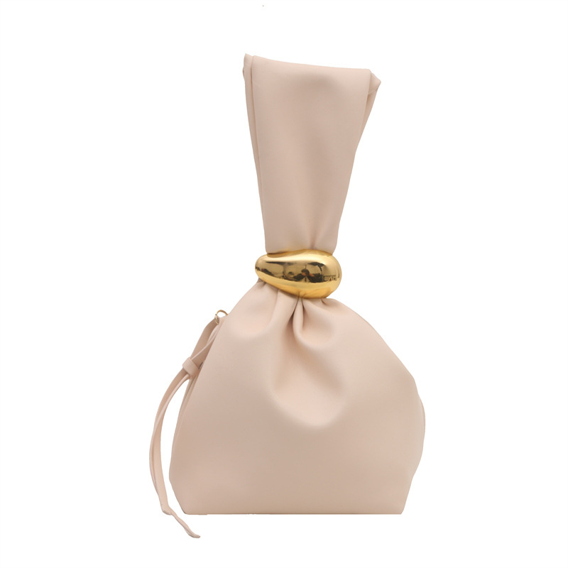 Textura bolso pequeño portátil mujer 2024 otoño e invierno nuevo estilo retro pliegue estilo occidental diseño de nicho bolso de cubo de moda