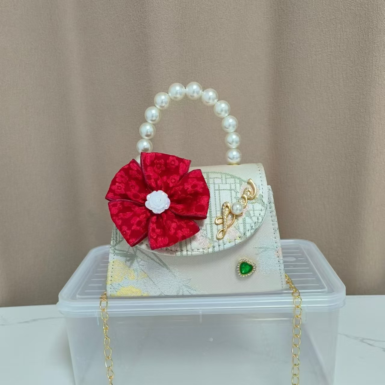 Bolsa infantil nueva niñas bolso de hombro accesorios de ropa china bolso cuadrado princesa bolso de perlas bolso arco bolso de mochila