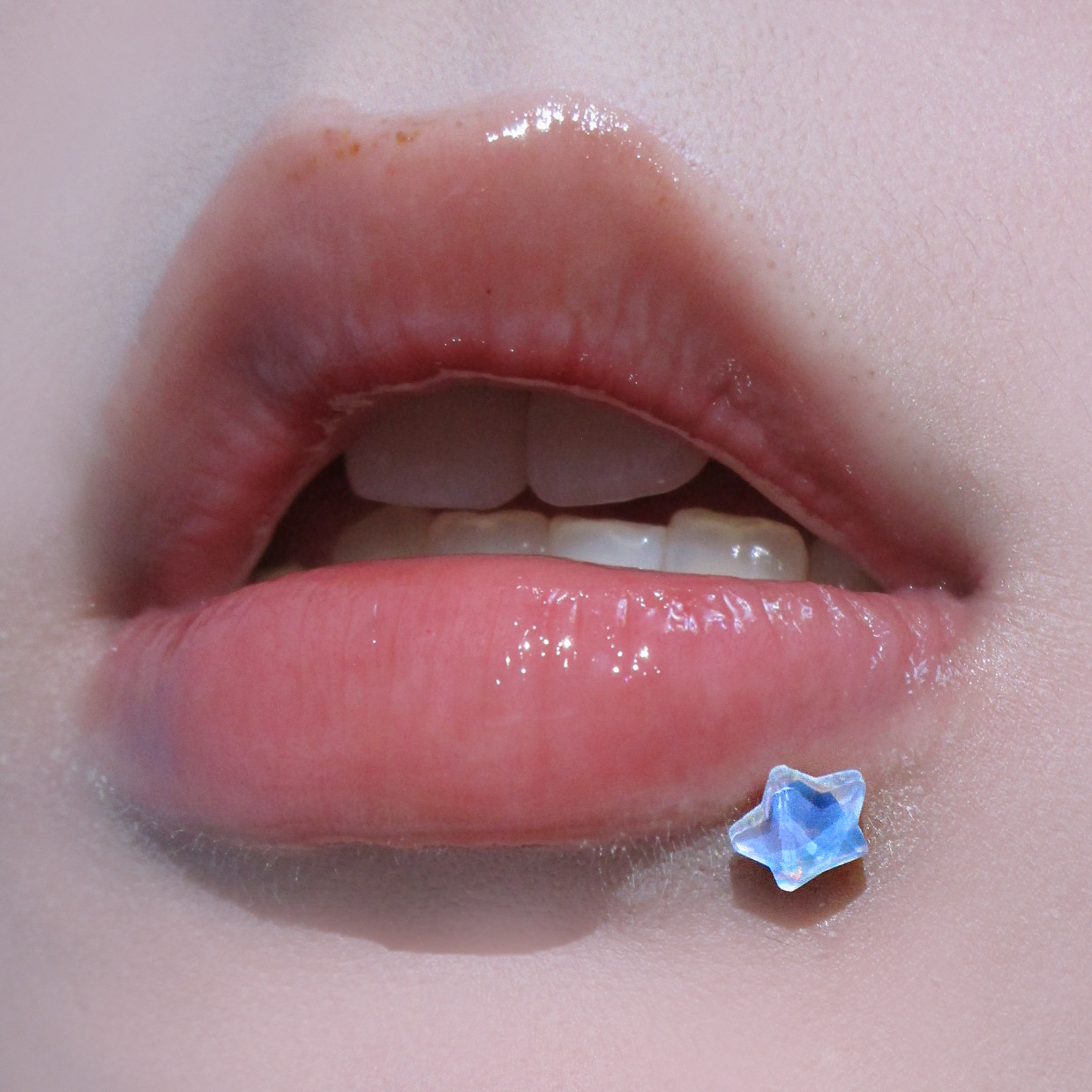 Silver pointed spike labret stud material detail