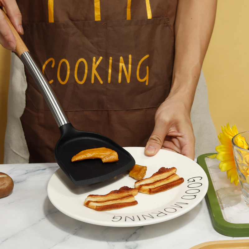 Cuchara de sopa de espátula de silicona transfronteriza Juego de 8 piezas de sartén antiadherente Pala de silicona de grado alimenticio Juego de utensilios de cocina de silicona para el hogar al por mayor