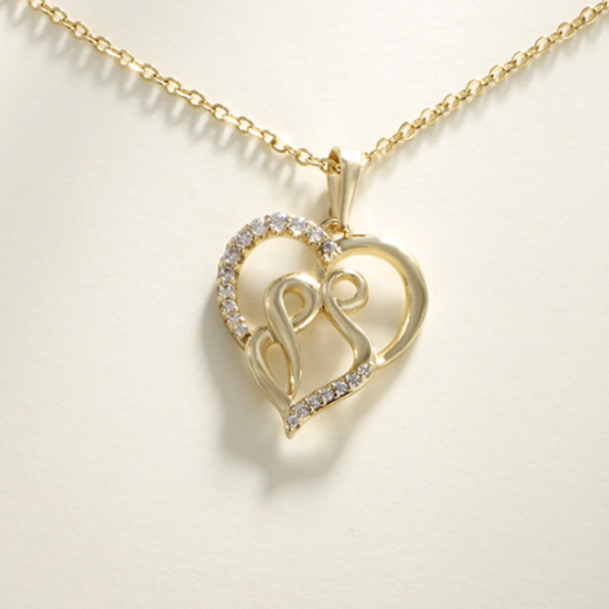 Xuping aleación de cobre chapado en oro hueco colgante de corazón de verano de alta calidad transfronteriza nuevo amor colgante de zircon collar