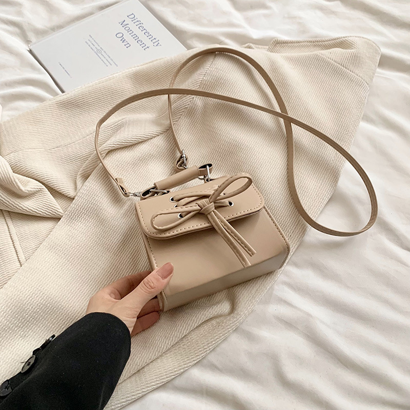 Diseño coreano de nicho bolso de mujer 2024 mini personalidad versátil bolso de moda arco de hombro bolso pequeño