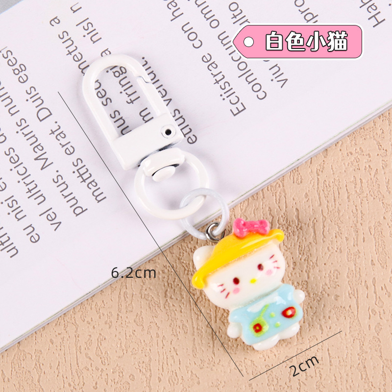 Nuevo estilo de dibujos animados estudiantes llaveros lindos colgantes de resina accesorios bolsos escolares amigos regalos llaveros al por mayor