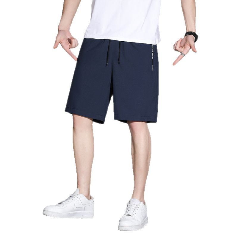Pantalones cortos de moda para hombres de verano, seda de hielo, estilo fino, nuevos pantalones casuales sueltos de secado rápido para hombres, pantalones de cinco puntos, pantalones deportivos