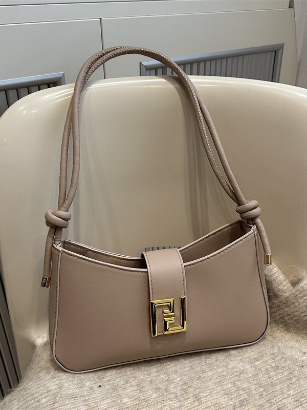 Bolso popular de textura francesa, bolso de luna nueva de estilo occidental, femenino 2024, nuevo bolso diagonal portátil de nicho francés de color sólido de moda