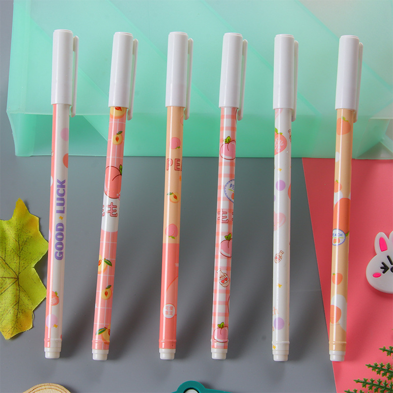 Pluma de gel de jugo de melocotón creativo melocotón tire tapa pluma de agua estudiante papelería suministros de oficina firma pluma al por mayor