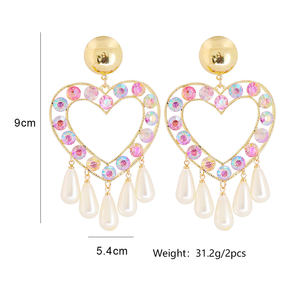 Creative Heart-shaped Water Drop Pearl Shape Female Stud Earrings display picture 1