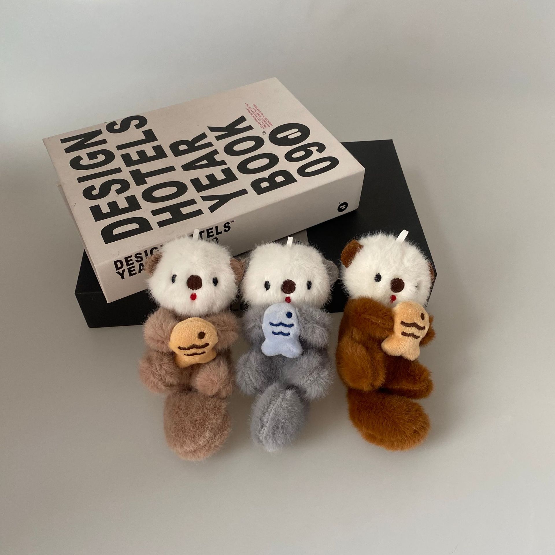 Cute Holding Fish Sea Otter Boutique Plush Keychain Otter School Bag Pendant Doll Machine Aquarium Gift Couple's