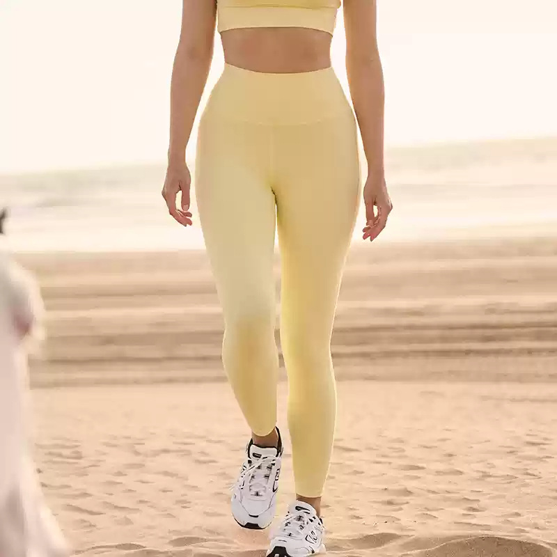 Pantalones de compresión de cadera transpirables y cómodos para eliminar el sudor. Pantalones de yoga de nueve puntos. Pantalones deportivos para correr.