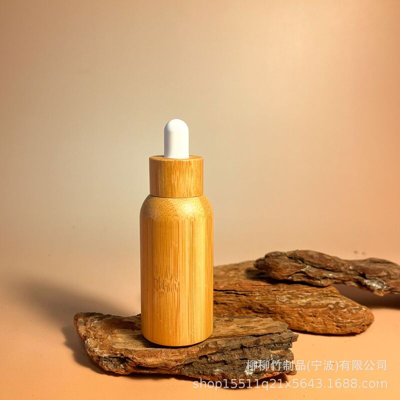 竹のゴムの頭の点滴の瓶の精華の液体の携帯は瓶の竹の製の光を避ける精華を分けて瓶の竹の木を分けて瓶を詰めます|undefined