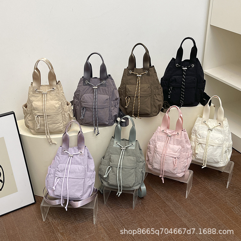 2026 New Drawstring Bucket Bag, Simple and Stylish Waterproof Backpack, Versatile Tote Handbag, Single Shoulder Crossbody Bag for Women 2026 New Drawstring Bucket Bag, Simple and Stylish Waterproof Backpack, Versatile Tote Handbag, Single Shoulder Crossbody Bag for Women