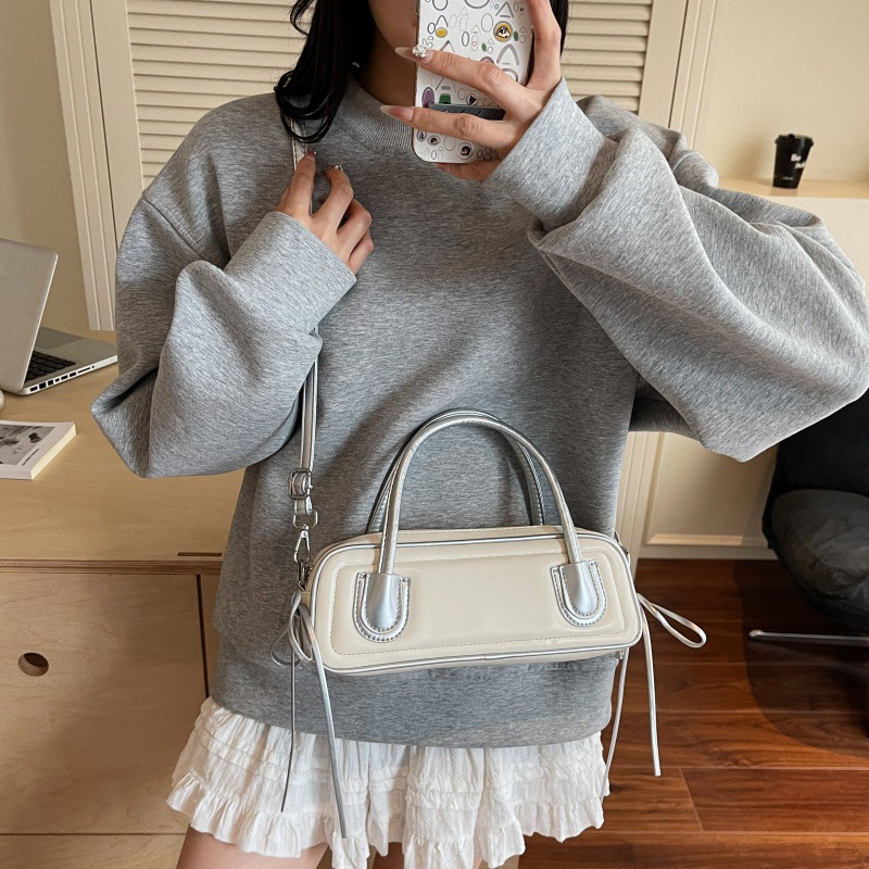 Bolsos populares de este año 2025 verano nuevo bolso femenino bolso de hombro de textura de alta calidad bowknot contraste color bandolera