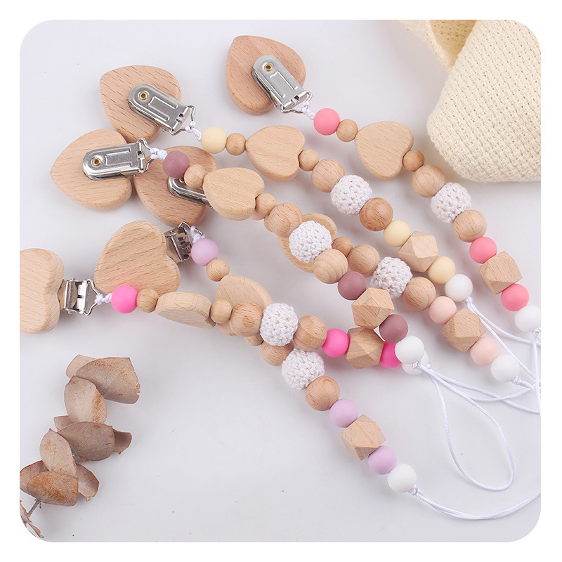 Productos para bebés y niños pequeños clip de tetina creativo caricatura bebé amor de beech mordida de dientes molares tetina cadena de prevención