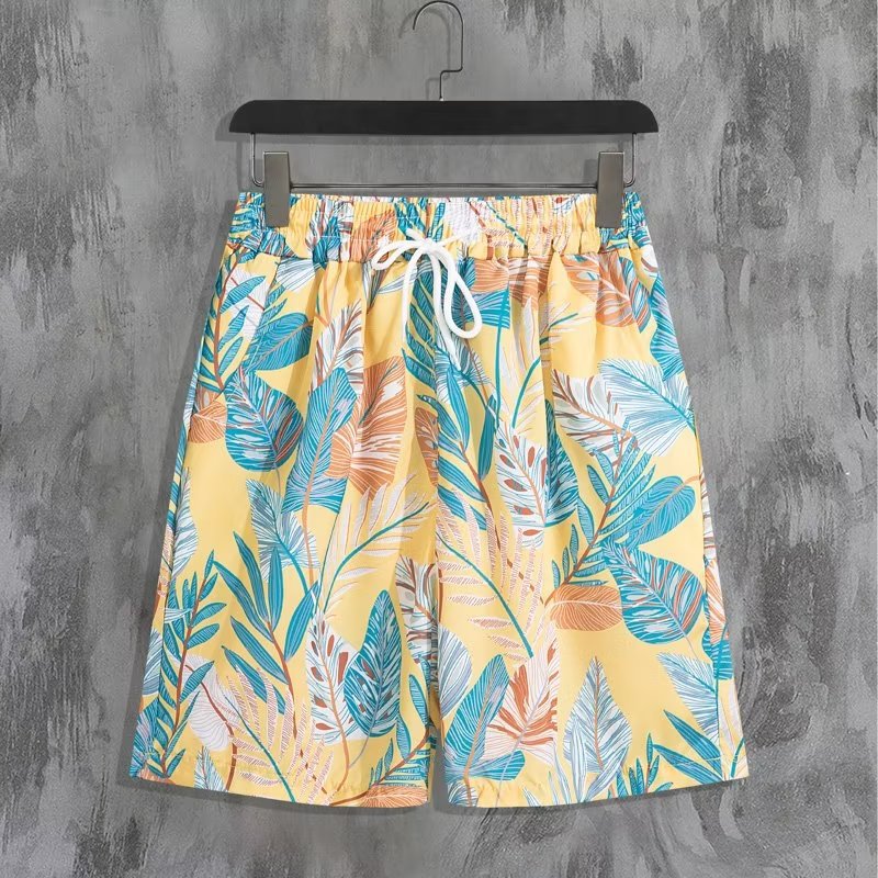 Completo da uomo a due pezzi: camicia a maniche corte, vestibilità ampia, taglie forti e pantaloncini con stampa alla moda in stile hawaiano da spiaggia, motivo floreale in seta ghiaccio._voghion.com