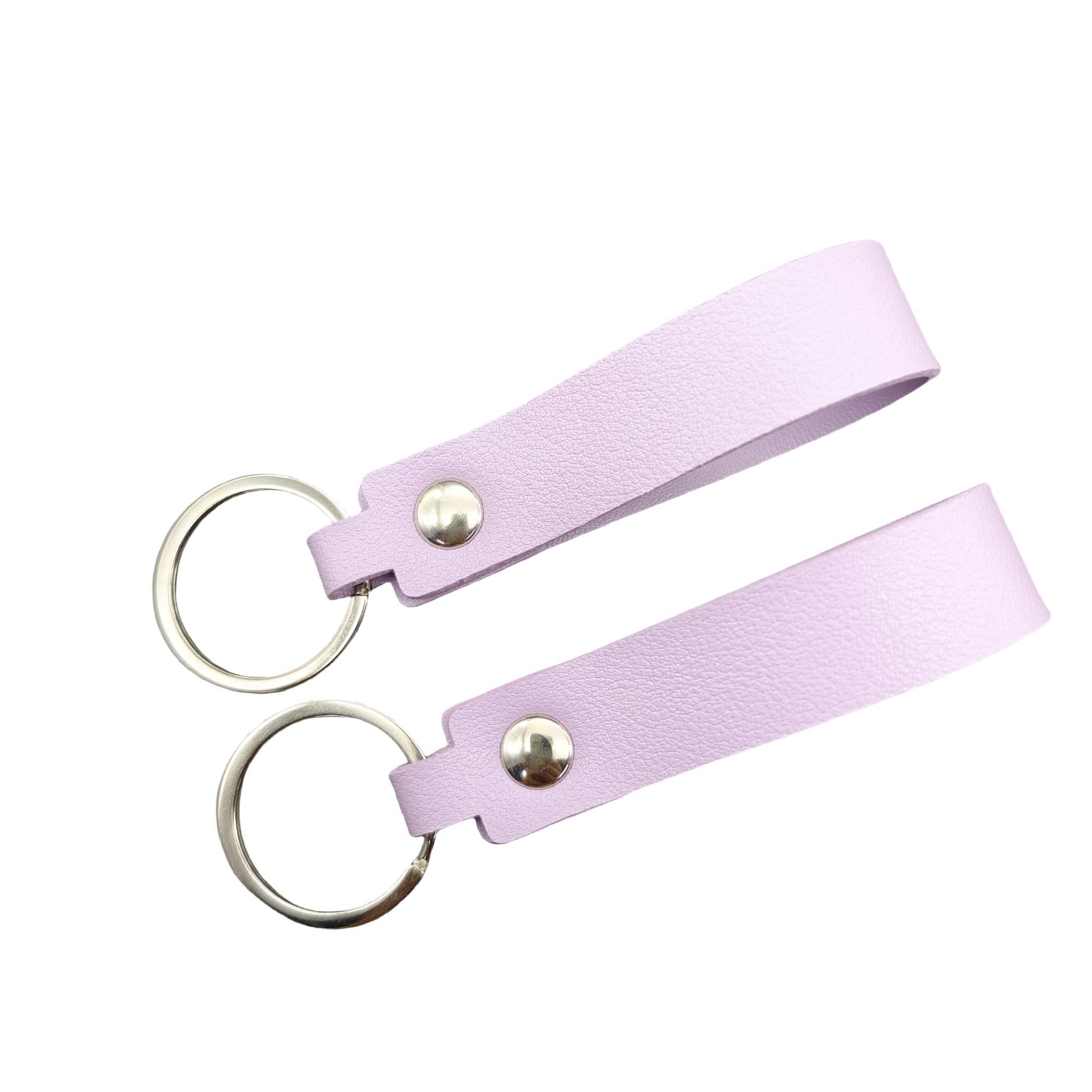 Clavera de cuero de doble cara colgante accesorios accesorios de bolsas accesorios de tendencia simple llavera de automóviles accesorios