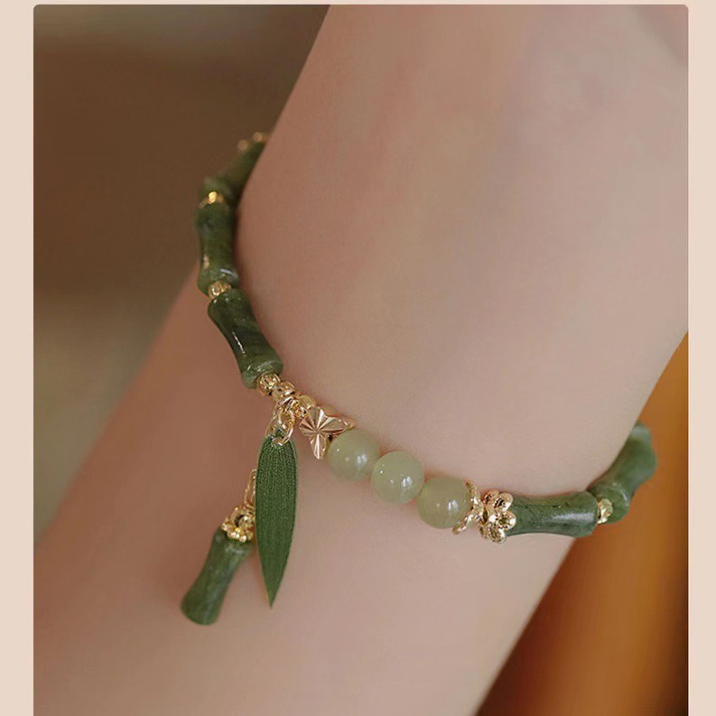 A retro Chinese-style olive jade bamboo joint bracelet for women, with a unique design and simple charm. A new Chinese-style Hetian jade bracelet for women, 253 undefined