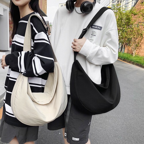 Crossbody bag for women  new large-capacity dumpling bag for college students, large size for male couples, lightweight solid color casual bag