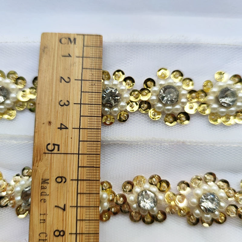 [网底布金色珠片订珠水钻太阳光条码服装辅料DIY花边]