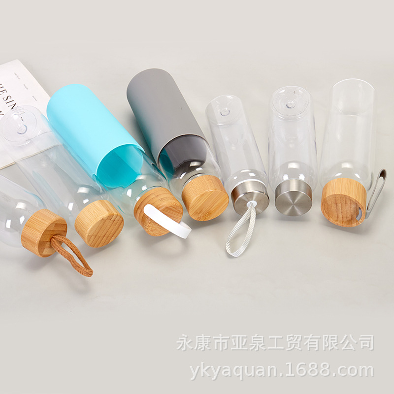 Suministro directo de fábrica Taza de vidrio con tapa de bambú transparente Taza de agua de vidrio de té de oficina de gran capacidad Taza de plástico transparente al por mayor