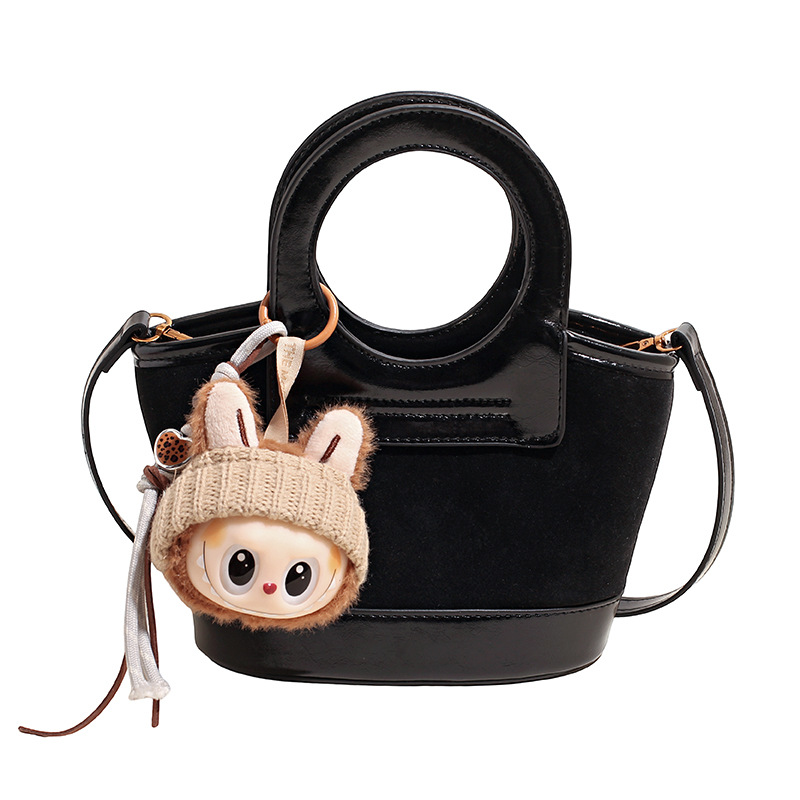 Bolso de mano coreano transfronterizo empalmado bolso de cubo de agua mujer otoño / invierno 2025 nuevo estilo de moda bolso de hombro bolso de viaje