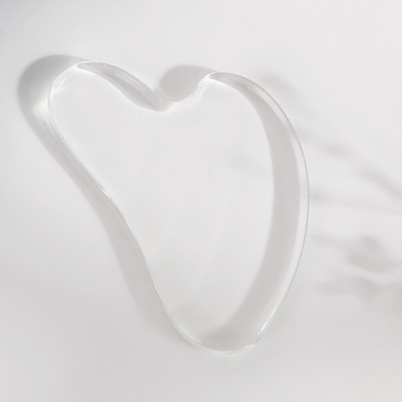 Rodillo facial de cristal en forma de corazón para masaje y lifting