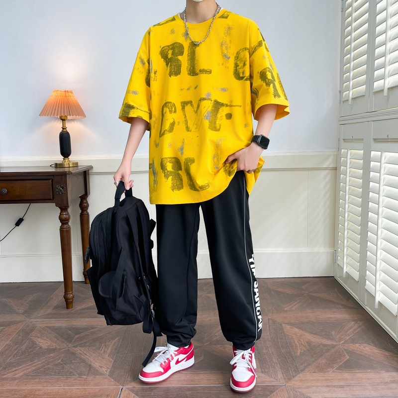 Set de verano de manga corta para hombres de moda de media manga suelta de moda impresa completa camiseta pantalones de dos piezas de moda universal