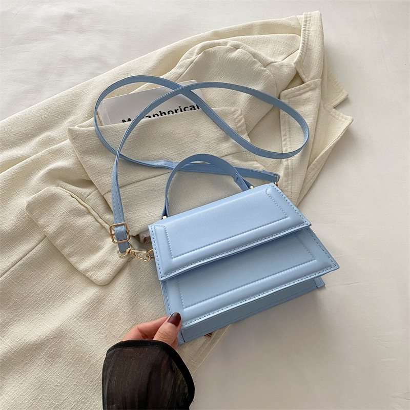 Calle casualidad de color sólido bolso de hombro 2024 nuevo tipo de bolso de mano casualidad nueva moda simple bolso de hombro